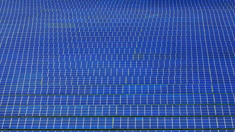 Blue-solar-panels-rows.-Alternative-energy-source.-Top-view-solar-panels-park