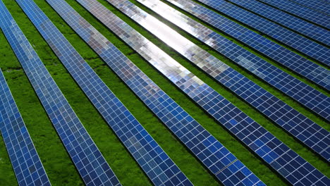 Drone-view-blue-solar-panels-pattern-on-nature-background.-Photovoltaic-panels.