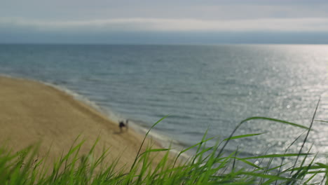Beautiful-sea-beach-landscape.-Two-people-enjoying-holiday-at-nature-ocean-coast
