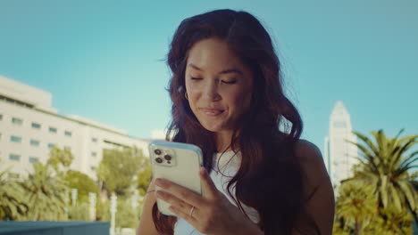 Portrait-of-happy-woman-use-smartphone-closeup.-Asian-girl-typing-message.