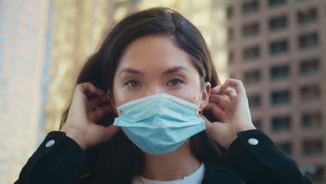 Portrait-of-asian-girl-wearing-face-mask.-Healthy-woman-care-of-safety-outdoors.