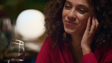 Smiling-girl-enjoying-wine-glass-on-romanic-date.-Beautiful-woman-in-restaurant.