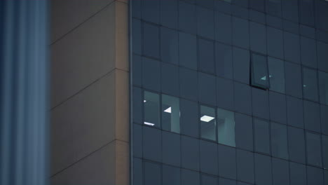 Drone-shot-office-windows-at-downtown-district.-Business-company-working-late