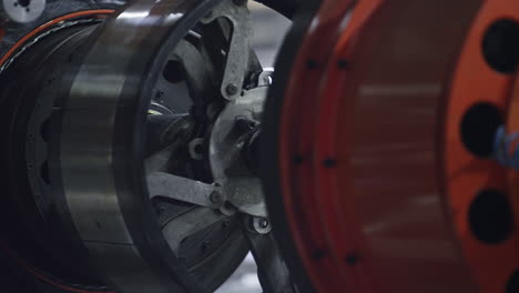 Detailed-automobile-tyre-plant-mechanism-moving-in-automotive-workhouse-closeup