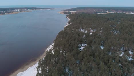 Latvia-Landscape-of-the-Lielupe-River-River-Shoreline-in-the-Winter,-Aerial