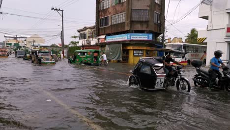 View-of-vehicles-driving-through-the-flooded-highway