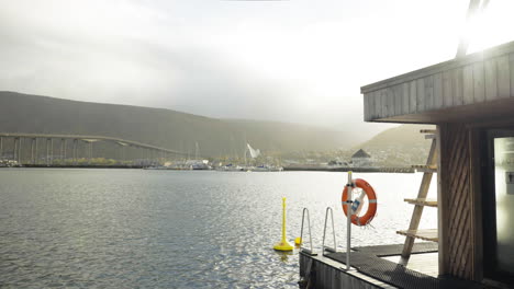 Beautiful-shot-of-mountains-and-ocean-on-coast-of-Tromso-in-Norway