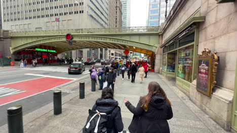 Walking-POV,-Grand-Central-terminal-bridge,-New-York-city-traffic-and-pedestrians-in-Manhattan-city-life