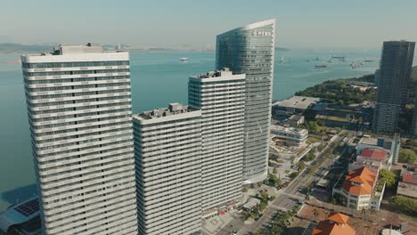 Zhong-Jiao-Cheng-Tou-business-building-in-Guangzhou-Nansha-Ferry-port,-aerial-view