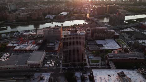 Aerial-view-approaching-the-425-Grand-Concourse-building,-sunny-evening-in-The-Bronx,-New-York