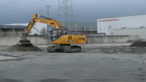 Excavator-Working-At-The-Construction-Site-Of-A-Building-In-Park-West,-Dublin,-Ireland