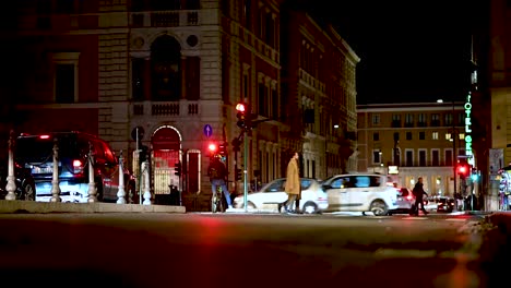 Busy-street-with-traffic-through-the-streets-in-Rome,-Italy