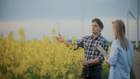 Farmer-And-Agronomist-Discussing-In-Farm