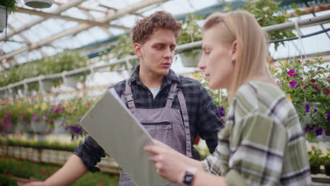 Farmer-Explaining-And-Scolding-Colleague-At-Greenhouse