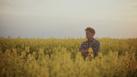 Thoughtful-Farmer-Amidst-Plants-In-Farm