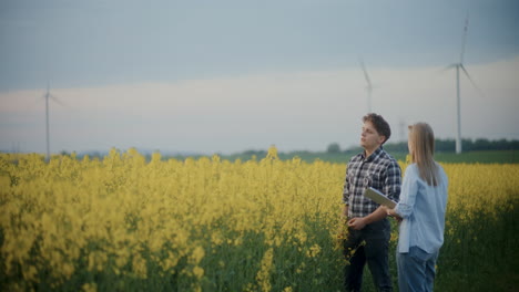 Agronomist-And-Farmer-Discussing-In-Farm