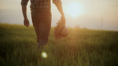 Farmer-With-Straw-Hat-Walking-In-Farm