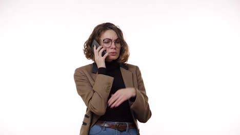 Confused-european-woman-holding-cell-phone-having-problem-with-the-calling-person,-frustrated-angry-girl-received-bad-news-at