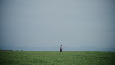 Male-Farmer-In-Field-Against-Sky