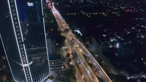 Aerial-Hyperlapse-of-long-multiple-lane-road-at-night-in-the-center-of-Jakarta