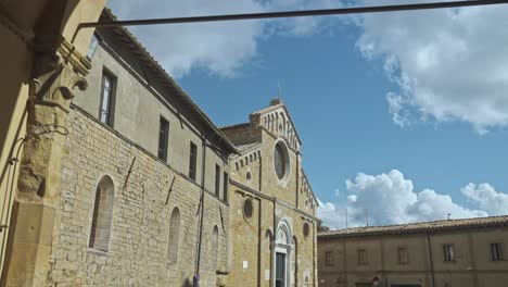 Walking-towards-the-Volterra-Cathedral-[-Santa-Maria-Assunta-],-Volterra,-Province-of-Perugia,-Italy
