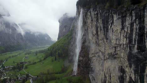 Staubbach-Waterfall-on-Lauterbrunnen,-Switzerland-Mountain-Cliff---Aerial-Drone-View