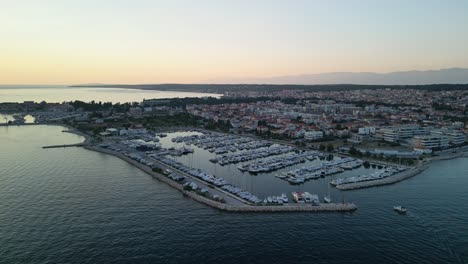 Aerial-over-part-of-the-city-Zadar,-Borik-marina