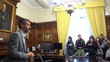 Tour-Guide-Speaks-to-Tourists-Inside-the-Central-Bank-of-Santiago,-Chile,-Travel-and-Tourism-Destination