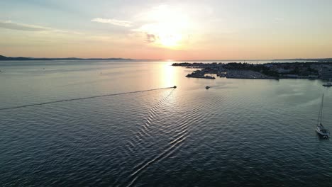 An-aerial-sunset-over-Zadar,-Croatia-with-Borik-marina