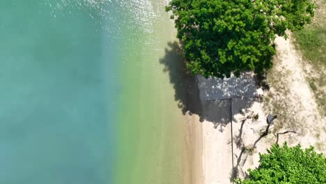 Drone-shot-of-a-beach-in-Phuket,-Thailand