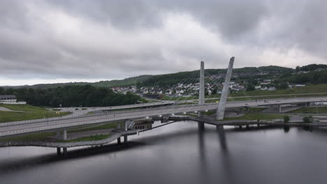 Dramatic-Cloudy-Sky-At-Farris-Bridge-Over-The-Lake-On-The-Town-Of-Larvik-In-Norway