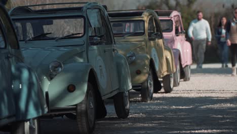 Citroën-2CV's-parked-and-lined-up-for-the-tourists-to-take-an-adventurous-tour-with-these-vintage-cars