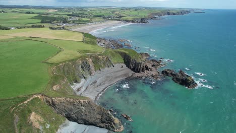 Looking-back-along-the-Copper-Coast-Waterford-Ireland-Tra-Na-NBno-Beach-and-Bunmahon-beach-and-the-Copper-Coast-Drive-stretching-along-the-coast
