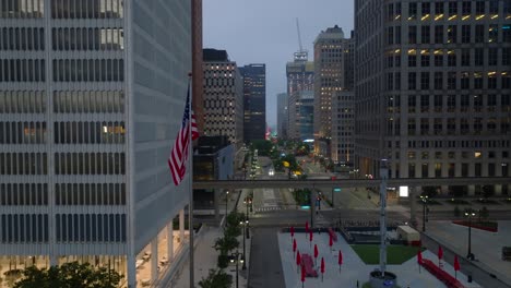 American-flag-waving-at-dawn-in-Detroit,-Michigan
