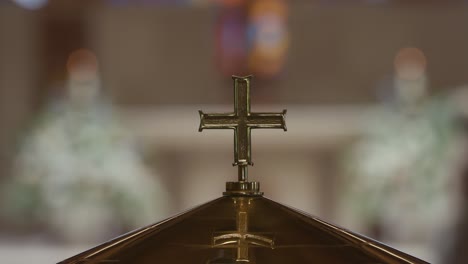 Closeup-of-Cross-on-Podium-in-Catholic-Church