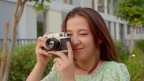 Professional-photographer,-woman-clicks-photos-using-old-soviet-camera
