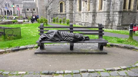 Homeless-Jesus-in-front-of-Christ-Church-Cathedral,-Dublin,-Ireland