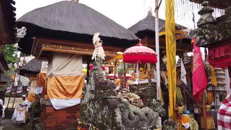 Balinese-People-Walk-Inside-Ancient-Temple-Traditional-Architecture,-Bali-Hindu-Indonesia,-Southeast-Asia