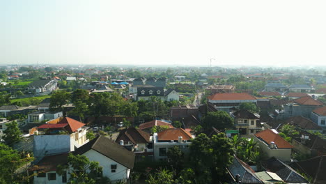 Residential-district-of-popular-tourist-resort-Canggu,-Bali,-Indonesia,-aerial-view