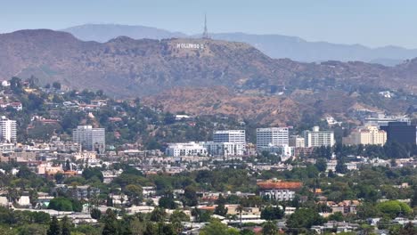 Los-Angeles-CA-USA,-Aerial-View-of-Heatwave-Mist-Above-Hollywood-and-Landmark-Sign