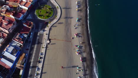 Drone-footage-of-a-beach-by-a-road-near-Gibraltar