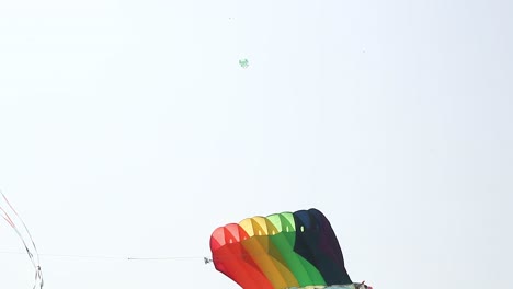 Thousands-fly-their-kites-as-high-as-they-can-at-the-International-Kites-Festival,-Argentina's-Flagwadi-flies-a-giant-kite-into-space