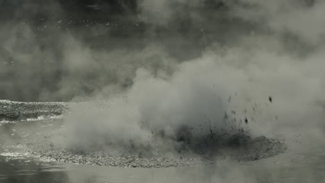 Boiling-hot-geothermal-volcanic-mud-pool,-closeup-shot-steamy-lake-bubbling-mud