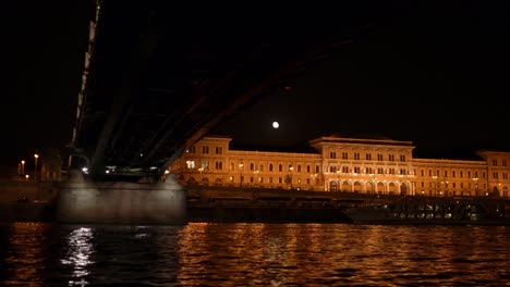 Iconic-Liberty-bridge-connecting-Pest-and-Buda-across-the-Danube-river,-Corvinus-university-of-Budapest,-Hungary