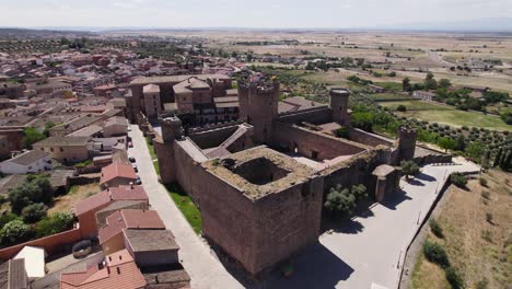 Aerial-orbit-of-inviting-castle-overlooking-picturesque-Spanish-village