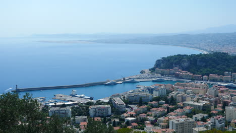 Distant-High-Angle-overlook-view-of-the-City-Nice,-France,-and-it's-Harbour-with-Luxury-Yachts