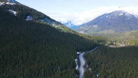 Aerial-pan-right-flying-over-Sea-to-Sky-Highway,-British-Columbia,-Canada