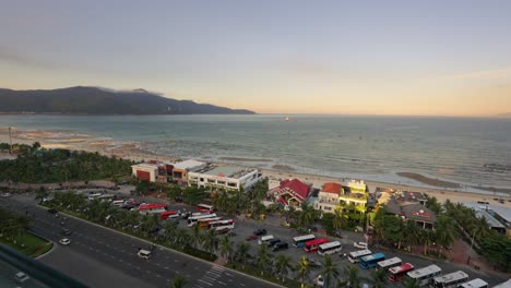 People-clean-up-trash-on-the-beach-with-a-beautiful-mountain-in-the-background