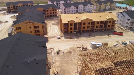 Aerial-Drone-Orbit-View-of-Apartment-Homes-Roof-Trusses---Residential-Building-Construction-Site-In-Austin,-Texas,-USA