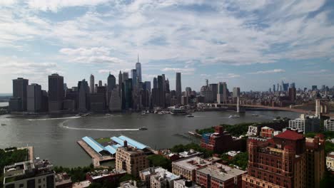 Manhattan-Skyline-with-Brooklyn-Bridge,-4K-aerial